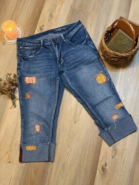 Upcycled Distressed Cottagecore Cuffed Jeans with Visible Mending and Patchwork